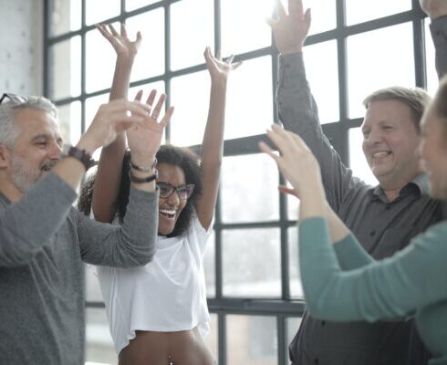 Students joyfully performing improv